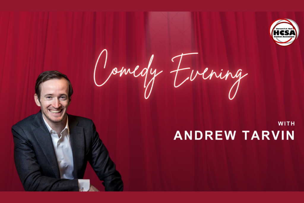 Andrew Tarvin headshot on theatre red curtain background