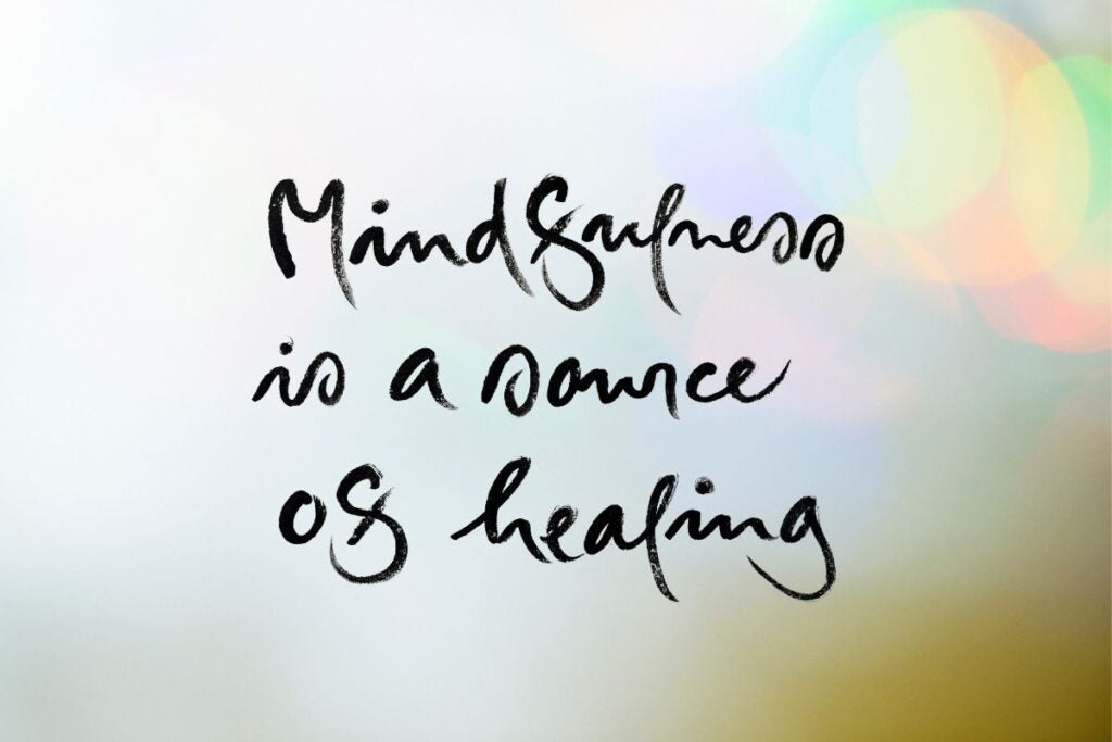 Light colored swirly background with text reading "Mindfulness is a source of healing"