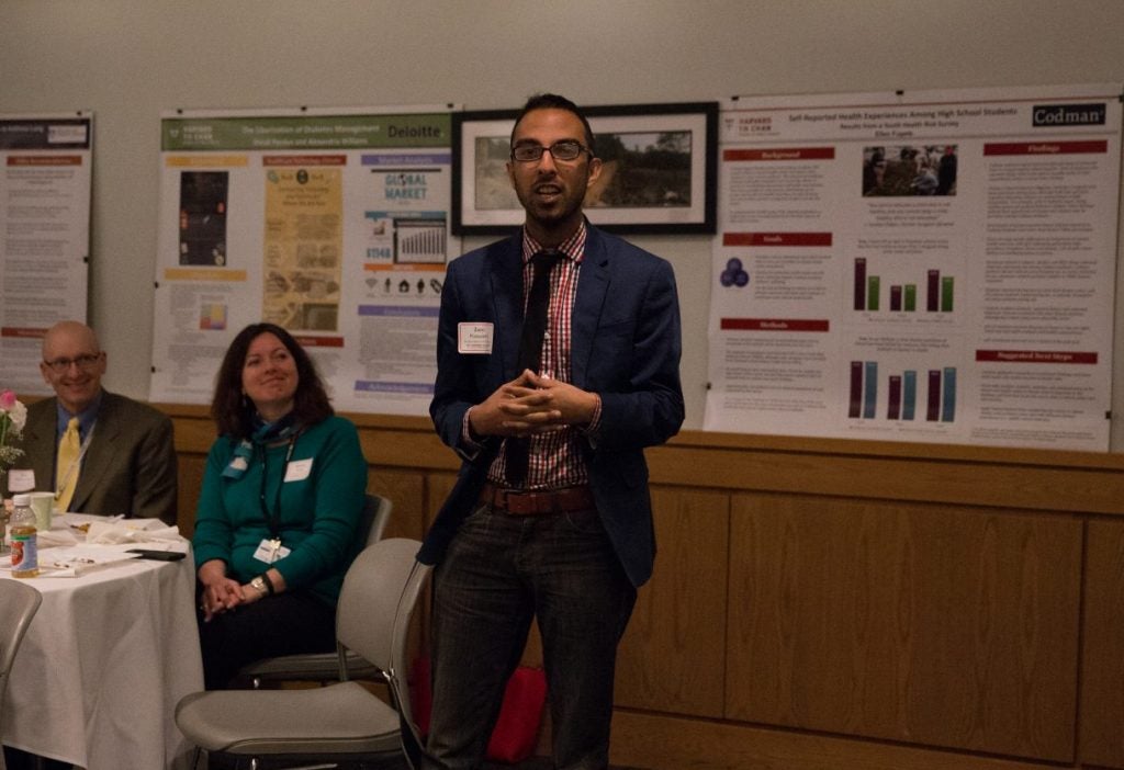 Zain Kassam, MD, MPH, FRCPC of OpenBiome at the 2016 Preceptor Appreciation Breakfast, describes his student Roshan Razik's Practicum project on C. difficile infections