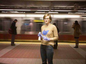 Catherine Baranowski, PhD ’18, swabs surfaces on Boston’sMBTA subway system, in a project that explores whetherhuman microbial communities are transferred in well traveled public places.