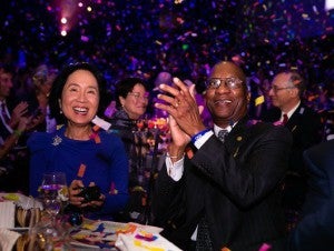 HSPH nutrition expert Lilian Cheung and Donald Hopkins, MPH '70, cheer the finale.
