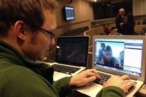 HSPH student Phil Summers video chats with PHI student Saw Htei Too