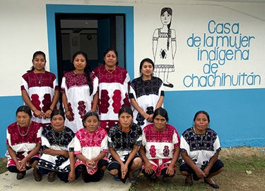 A group of midwives poses in front of their birth center in Chalchihuitan, Mexico