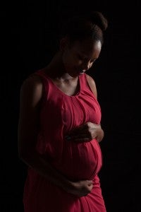 pregnant black african american baby mother woman red dress mortality maternal health