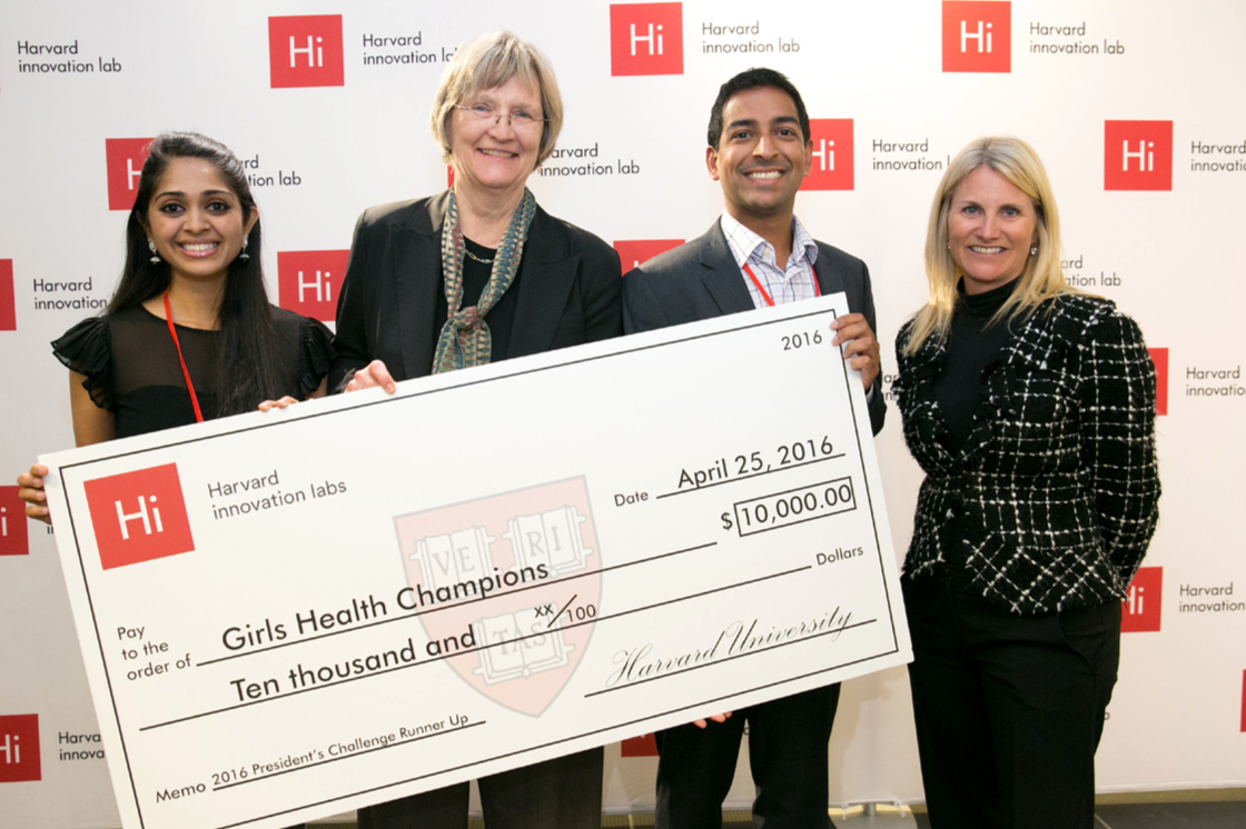 Girls Health Champions earned runner-up honors in Harvard’s President’s Challenge. From left, Priya Shankar, MPH ’16; Harvard President Drew Faust, Ricky Sharma, MPP ’18; and Jodi Goldstein, the Bruce and Bridgitt Evans Managing Director of the Harvard Innovation Labs. The team also received $5,000 for placing as finalists. Evgenia Eliseeva/Eve Photography